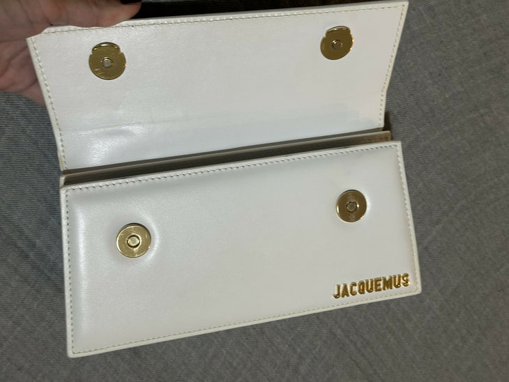White leather shoulder bag with gold Jacquemus logo — Jacquemus | Endless UAE