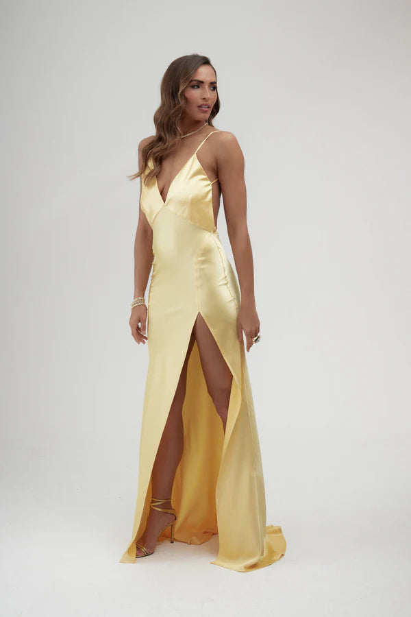 Backless yellow satin wrap dress with high slit and train — By Keara | Endless UAE