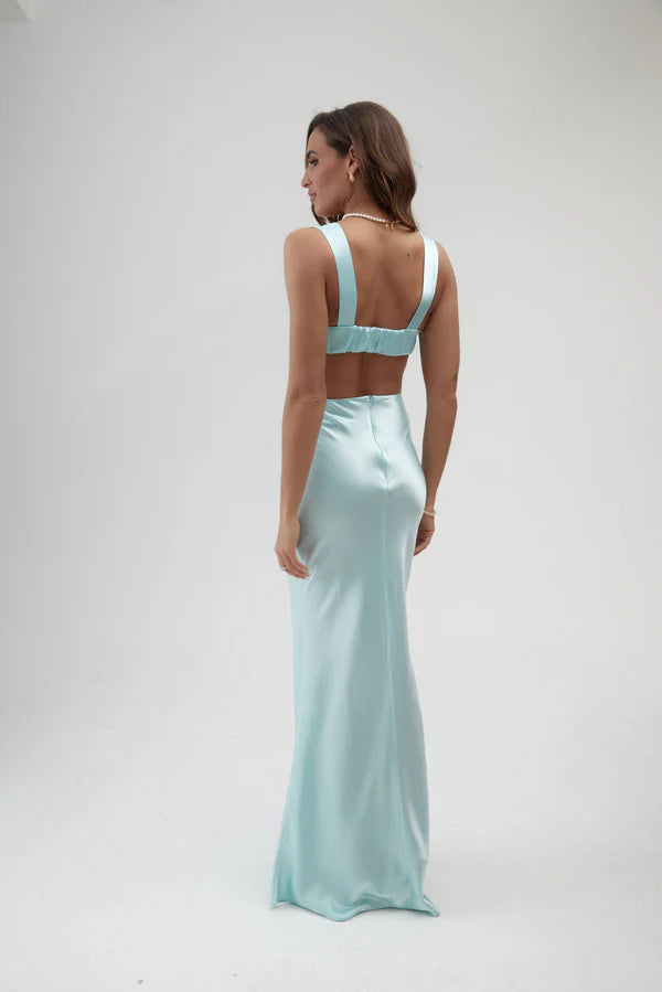 Light blue satin maxi skirt with high waist and floor-length silhouette, shown from back — By Keara | Endless UAE