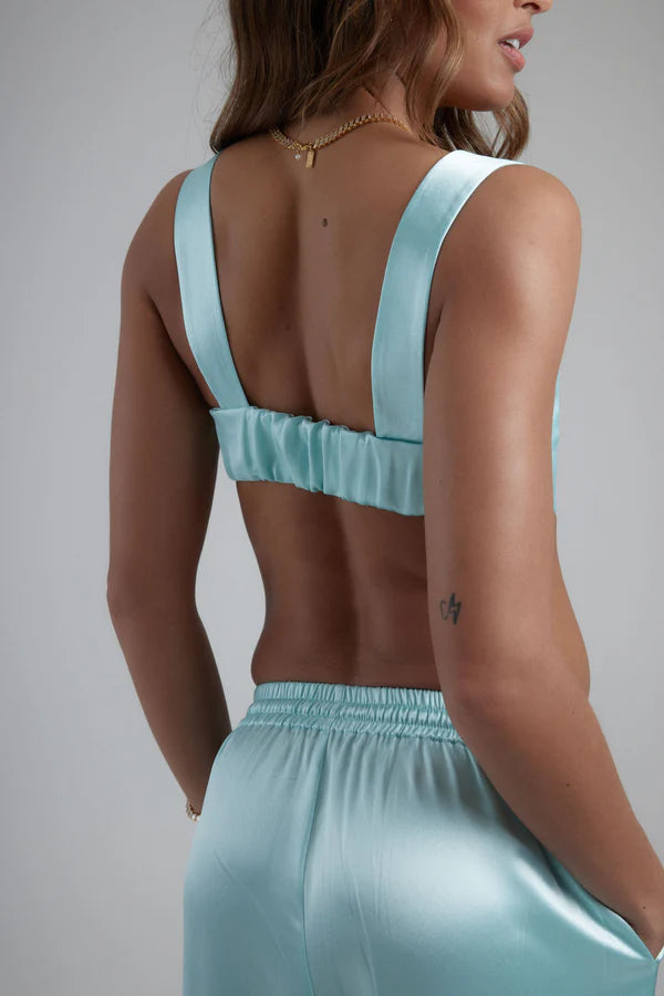 Light blue satin sculpted bralette with wide straps and open back design — By Keara | Endless UAE