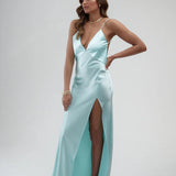 Elegant turquoise backless satin maxi dress with high slit and delicate straps — By Keara | Endless UAE