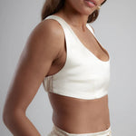 Woman wearing cream Sculpted Bralette with matching high-waisted pants against neutral background — By Keara | Endless UAE