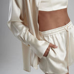 Cream oversized shirt with draped back detail — By Keara | Endless UAE