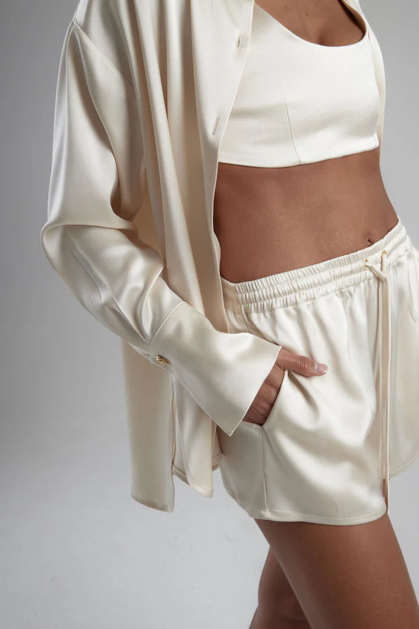Cream oversized shirt with draped back detail — By Keara | Endless UAE