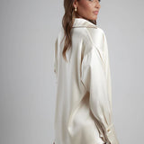 Cream oversized shirt with draped back detail — By Keara | Endless UAE