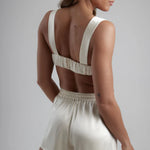 Ivory satin sculpted bralette with matching high-waisted shorts, shown from back view — By Keara | Endless UAE