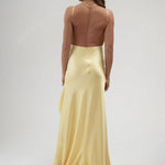 Backless yellow satin wrap dress with high slit and train — By Keara | Endless UAE