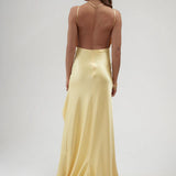 Backless yellow satin wrap dress with high slit and train — By Keara | Endless UAE