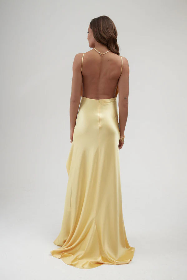 Backless yellow satin wrap dress with high slit and train — By Keara | Endless UAE