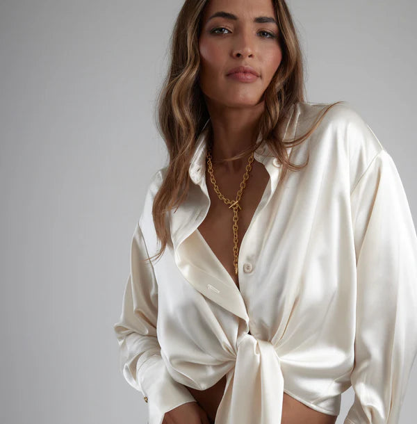 Cream tie-up shirt with gold chain necklace on model — By Keara | Endless UAE