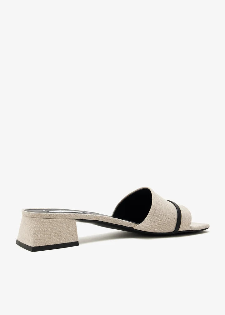 Low heel beige canvas mules with single strap and square toe design — The LLine | Endless UAE