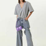 Ashton Cut-out Jeans in light blue denim with strategic knee and thigh cutouts — Attico | Endless UAE