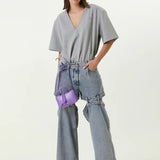 Ashton Cut-out Jeans in light blue denim with strategic knee and thigh cutouts — Attico | Endless UAE