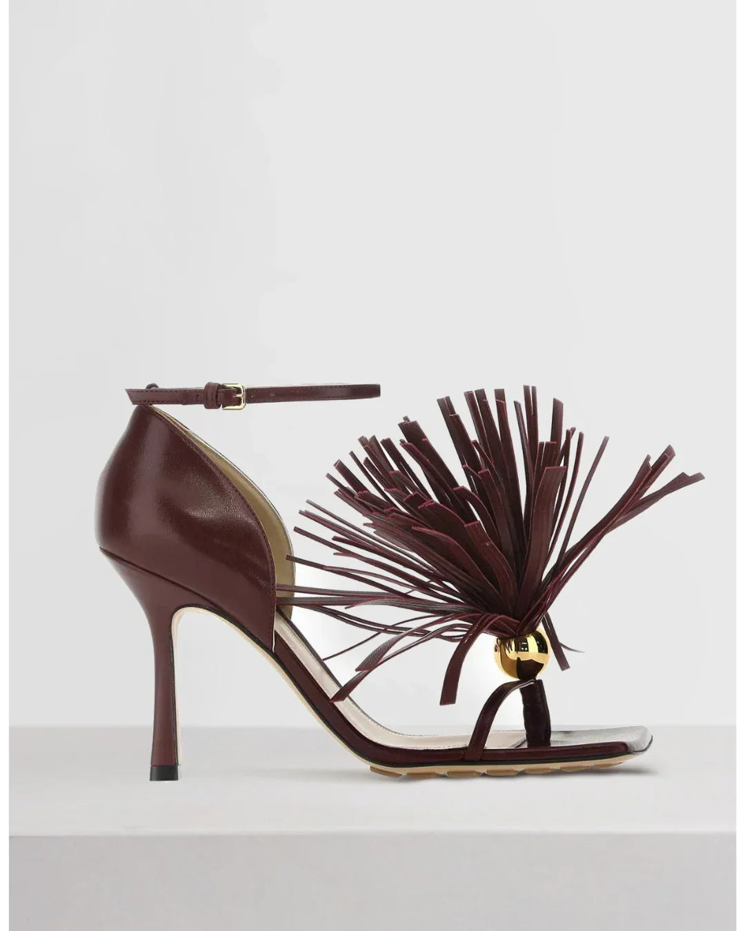 Burgundy leather sandal with tassel trim and ankle strap — Bottega Veneta | Endless UAE