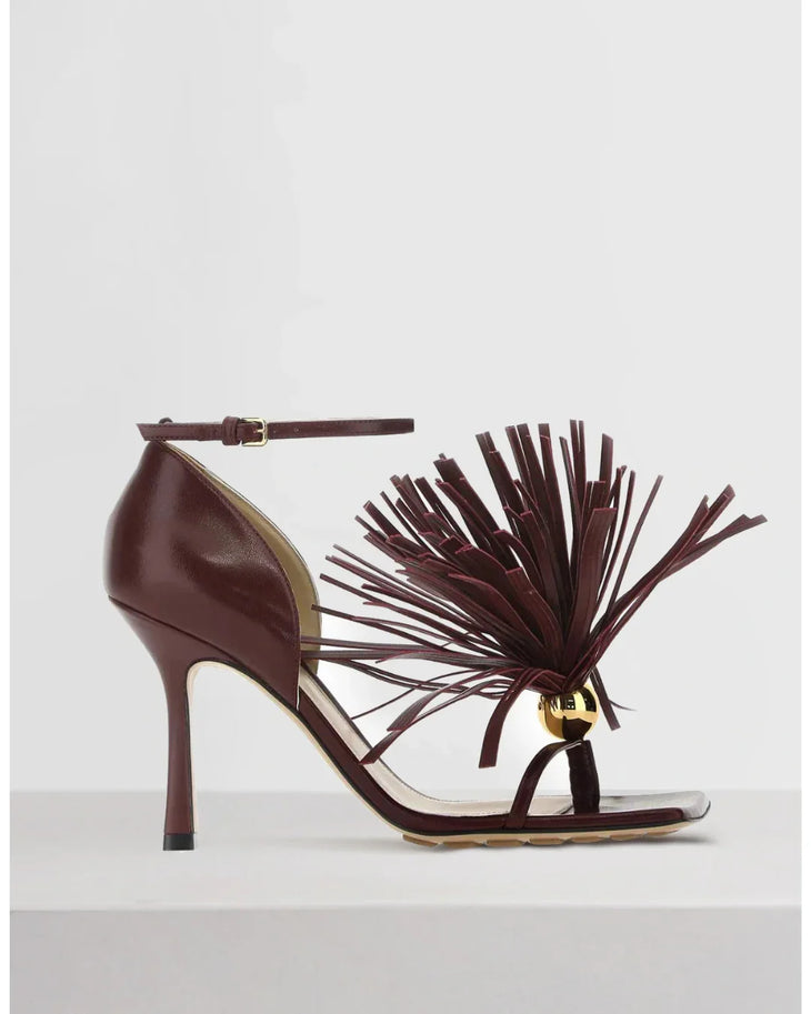 Burgundy leather sandal with tassel trim and ankle strap — Bottega Veneta | Endless UAE