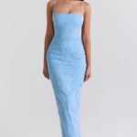 Blue floral embroidered maxi dress with thin straps on model sitting on chair — House of CB | Endless UAE