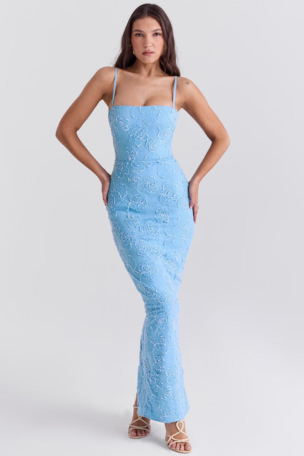 Blue floral embroidered maxi dress with thin straps on model sitting on chair — House of CB | Endless UAE