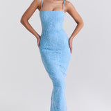 Blue floral embroidered maxi dress with thin straps on model sitting on chair — House of CB | Endless UAE
