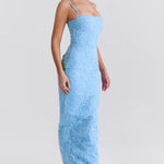Blue floral embroidered maxi dress with thin straps on model sitting on chair — House of CB | Endless UAE