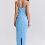 Blue floral embroidered maxi dress with thin straps on model sitting on chair — House of CB | Endless UAE