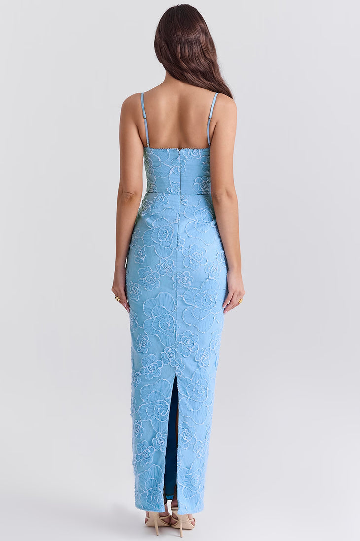 Blue floral embroidered maxi dress with thin straps on model sitting on chair — House of CB | Endless UAE