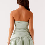 Sage green strapless bubble mini dress with ruched detailing and scalloped hem — Peppermayo | Endless UAE