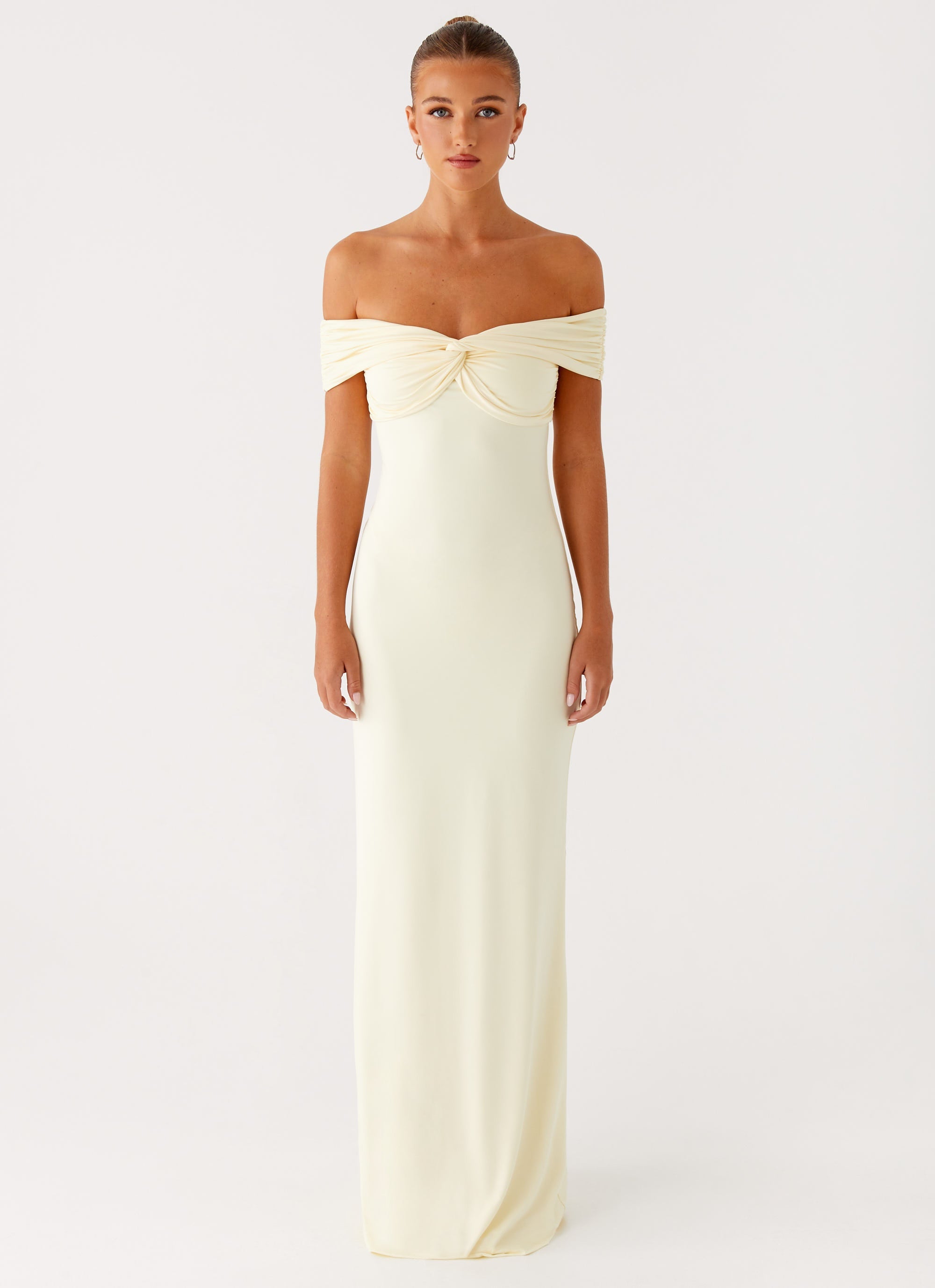 Cream off-shoulder maxi dress with ruched detailing and fitted silhouette — Peppermayo | Endless UAE