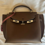 Brown leather structured handbag with gold hardware and pink shoulder strap — Endless | Endless UAE