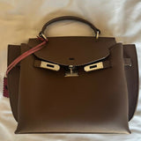 Brown leather structured handbag with gold hardware and pink shoulder strap — Endless | Endless UAE