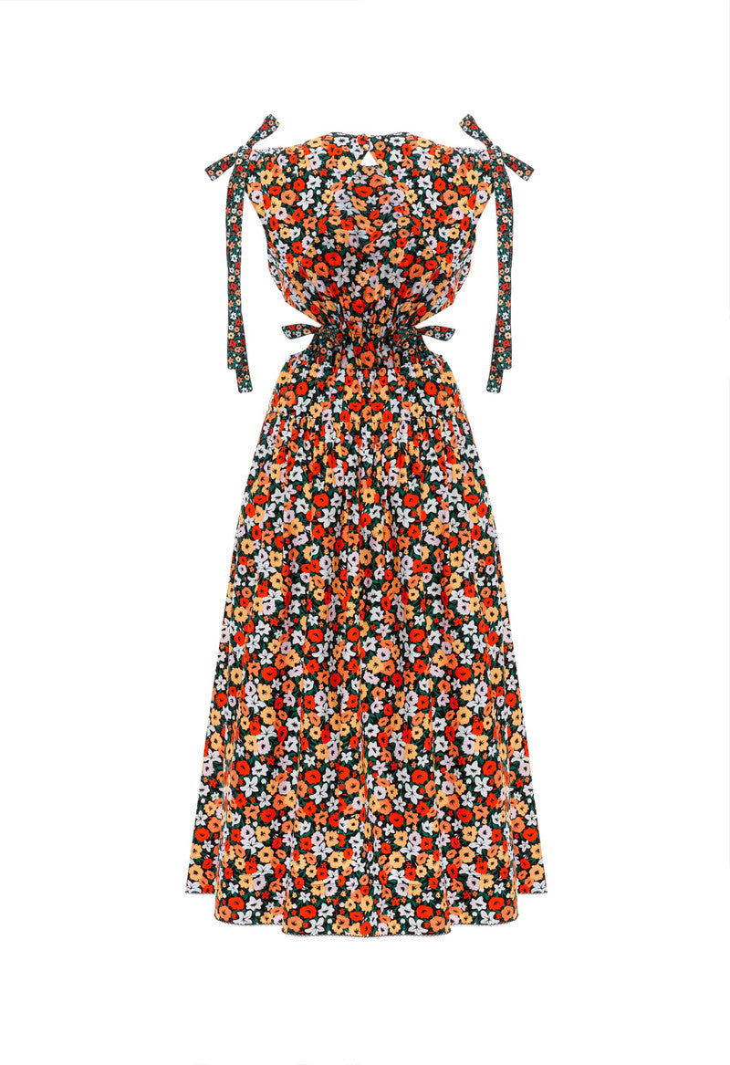 Woman wearing Guaguanco Midi Dress in colorful floral print with 3/4 sleeves — Agua By Agua Bendita | Endless UAE
