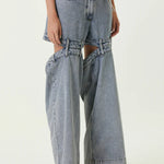Ashton Cut-out Jeans in light blue denim with strategic knee and thigh cutouts — Attico | Endless UAE