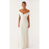 White off-shoulder sequin maxi dress with pleated bodice and floor-length silhouette — Peppermayo | Endless UAE