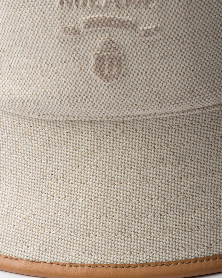 Cream linen blend bucket hat with tan leather trim and Prada logo — Prada | Endless UAE