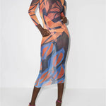 Sheer mesh maxi dress with vibrant orange and blue abstract print, long sleeves, and fitted silhouette — Louisa Ballou | Endless UAE