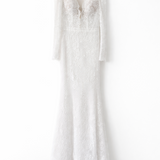Elegant white lace wedding dress with long sleeves and flowing tulle train — Tatiana Kaplun | Endless UAE