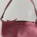 Pink leather mini shoulder bag with dual handles displayed against neutral background — By Far | Endless UAE