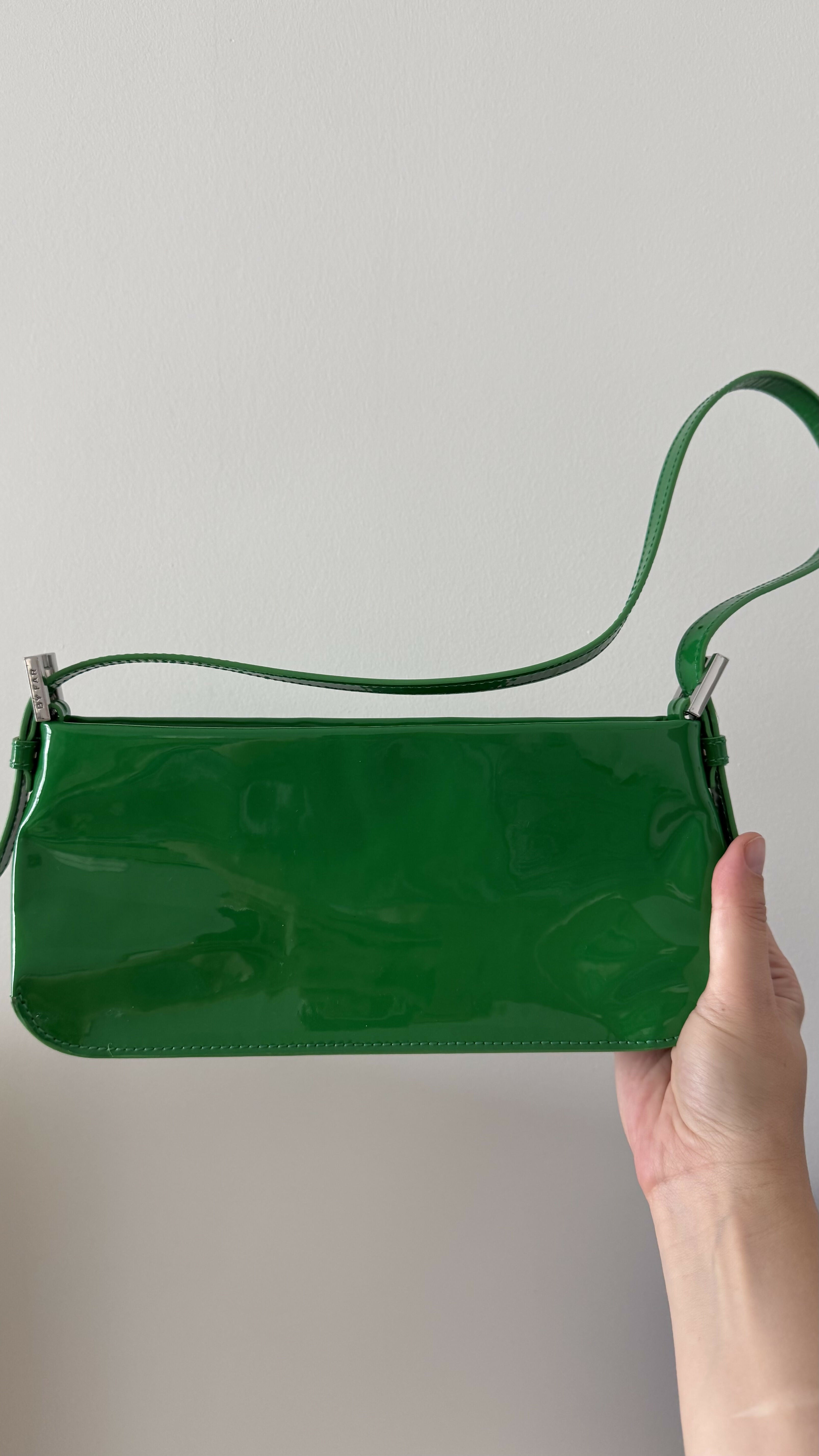 Dulce Patent Leather Shoulder Bag in vibrant green, held up against neutral background — By Far | Endless UAE