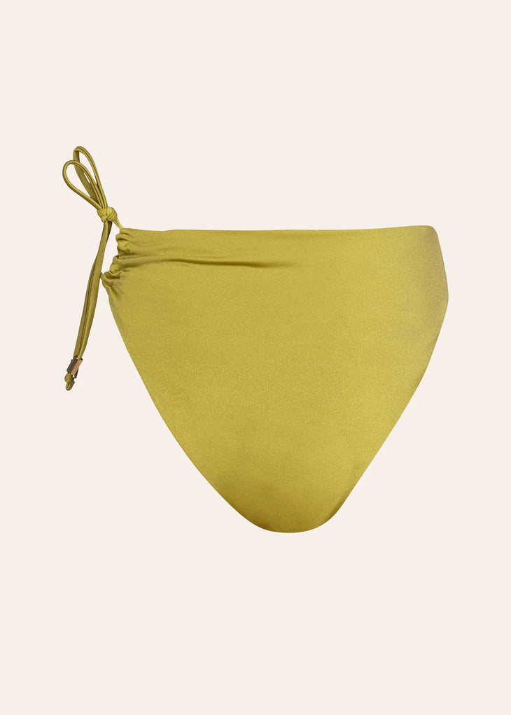 Olive green reversible bikini bottom with side tie detail on neutral background — Dvete | Endless UAE