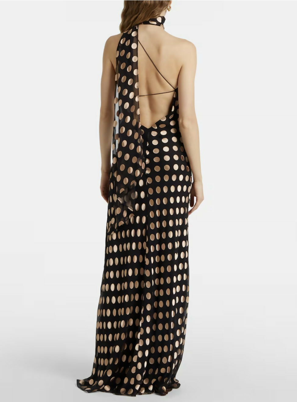 Black maxi dress with beige polka dots, featuring one-shoulder design and open back detail — Alexandra Miro | Endless UAE