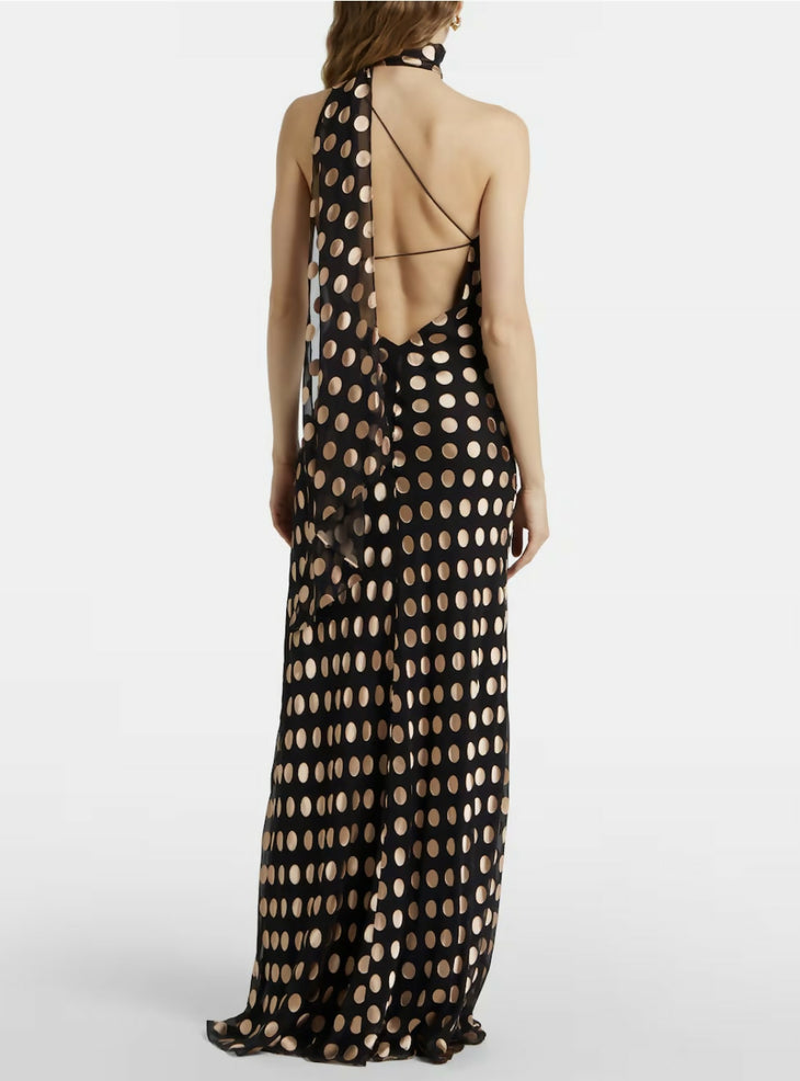 Black maxi dress with beige polka dots, featuring one-shoulder design and open back detail — Alexandra Miro | Endless UAE