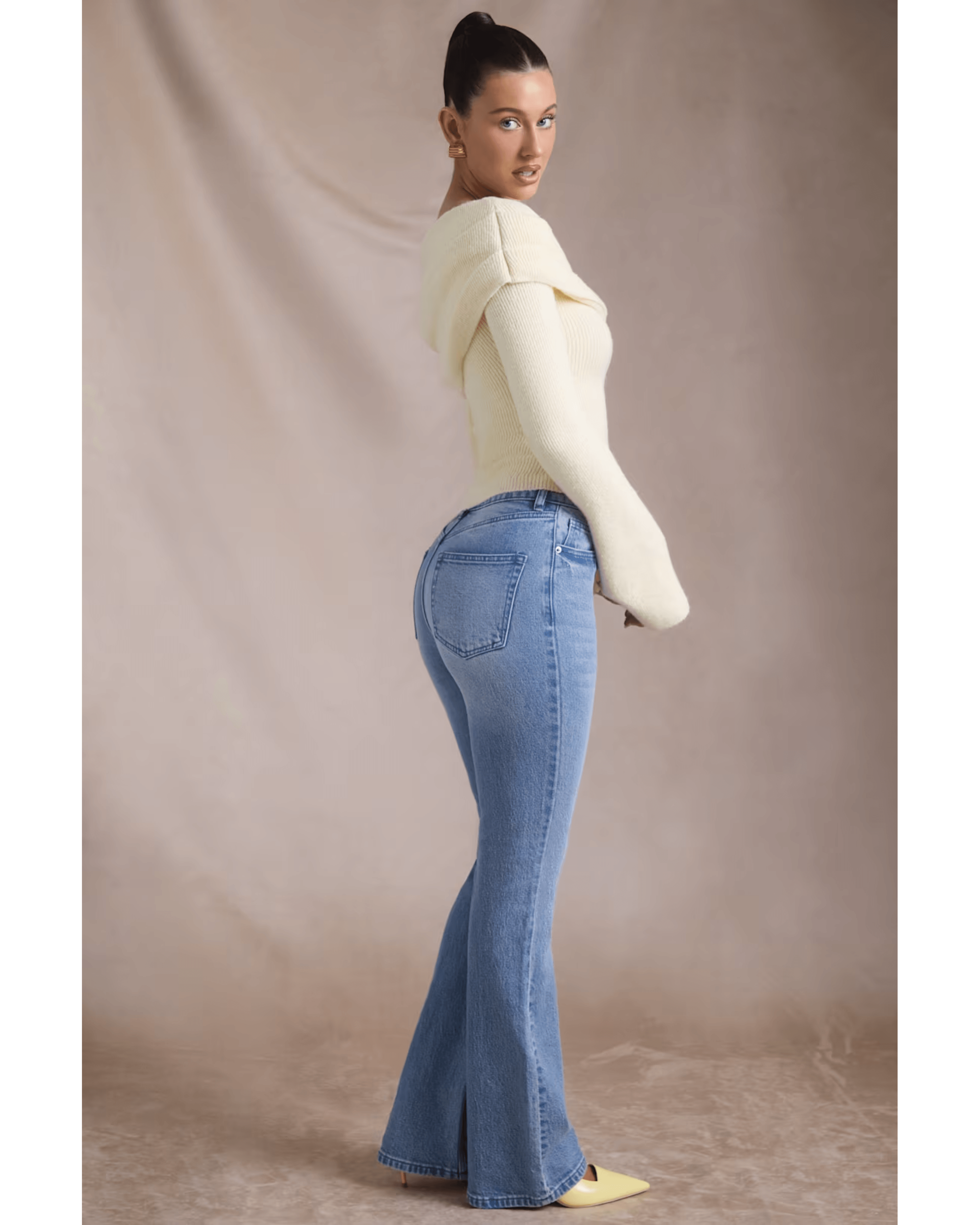 High-Rise Flared Jeans in Vintage Wash - Endless - UAE Rental and Resale for Women's Fashion