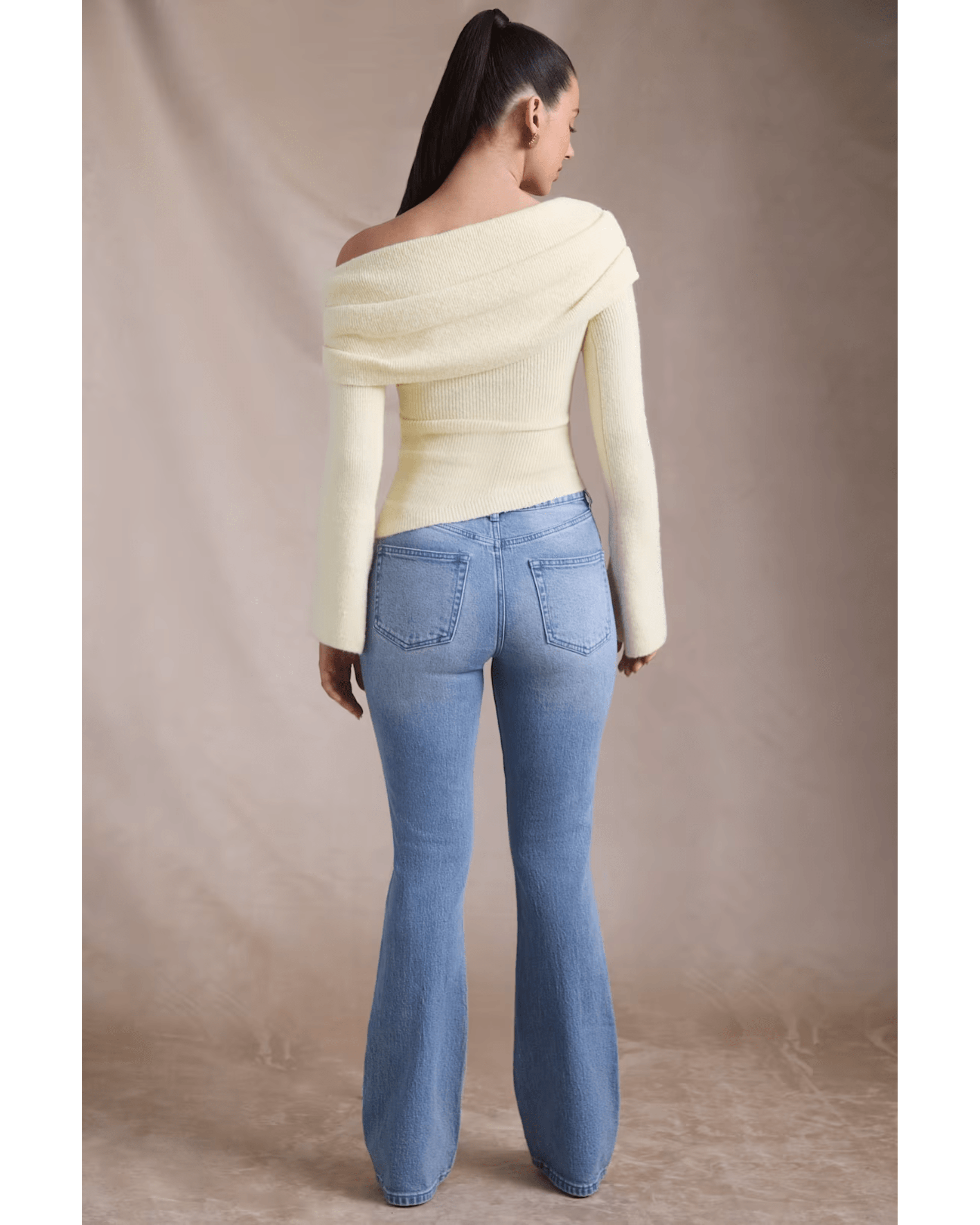 High-Rise Flared Jeans in Vintage Wash - Endless - UAE Rental and Resale for Women's Fashion