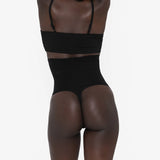 Woman wearing beige high waist thong in standing pose — Underhance | Endless UAE