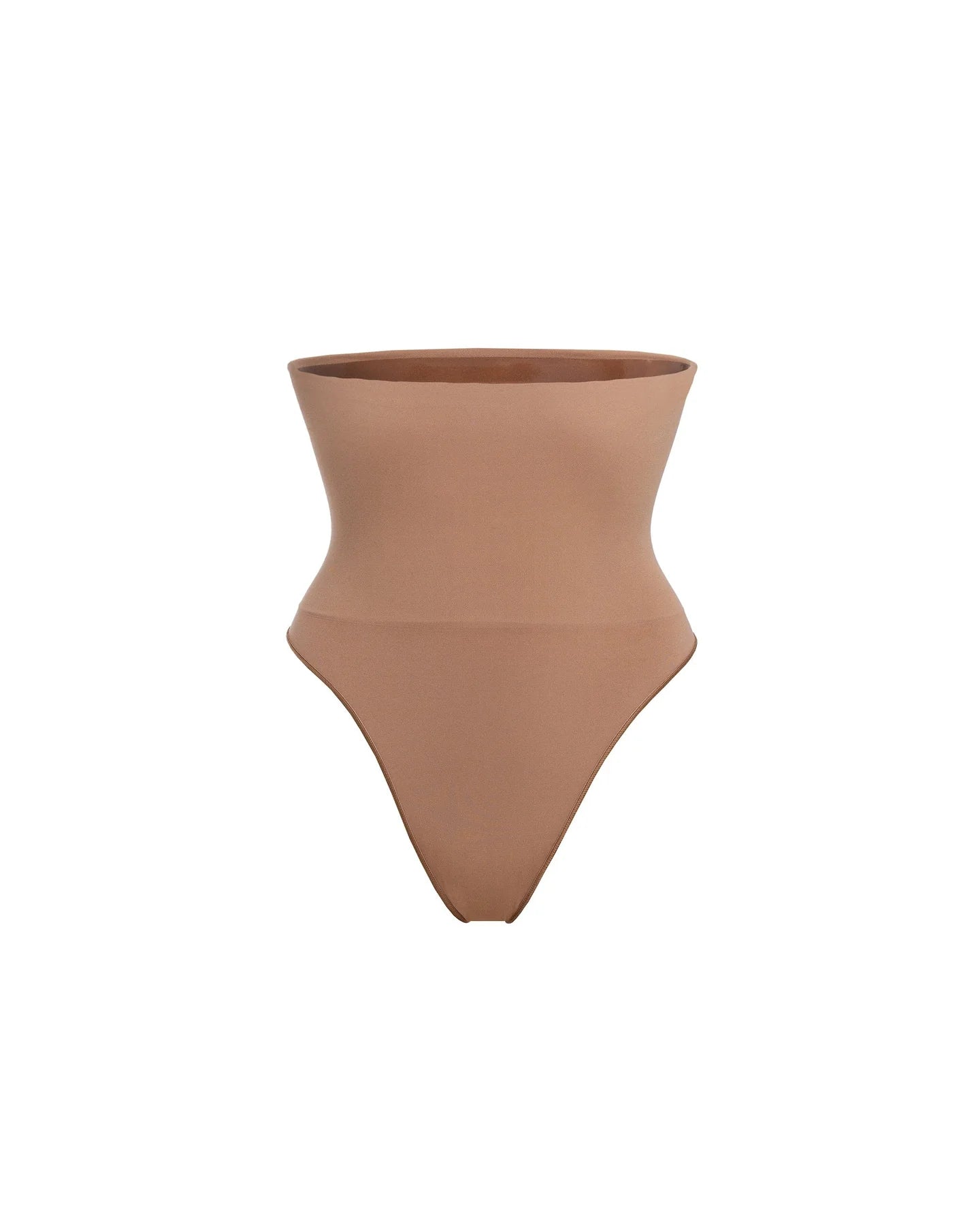 Woman wearing beige high waist thong in standing pose — Underhance | Endless UAE