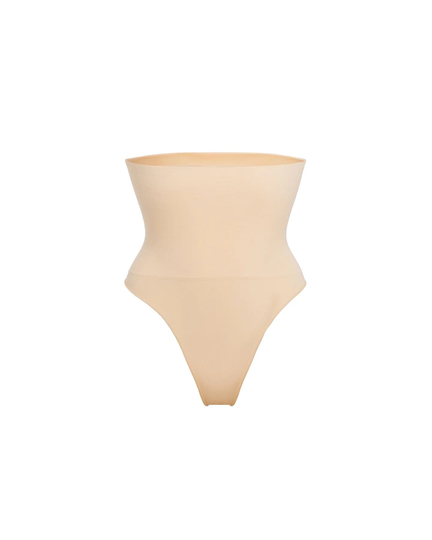 Woman wearing beige high waist thong in standing pose — Underhance | Endless UAE
