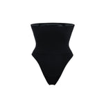 Woman wearing beige high waist thong in standing pose — Underhance | Endless UAE