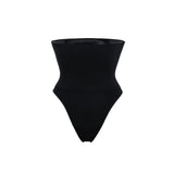 Woman wearing beige high waist thong in standing pose — Underhance | Endless UAE