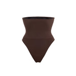 Woman wearing beige high waist thong in standing pose — Underhance | Endless UAE