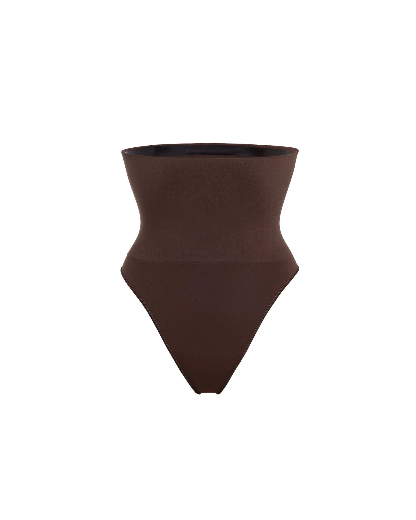 Woman wearing beige high waist thong in standing pose — Underhance | Endless UAE