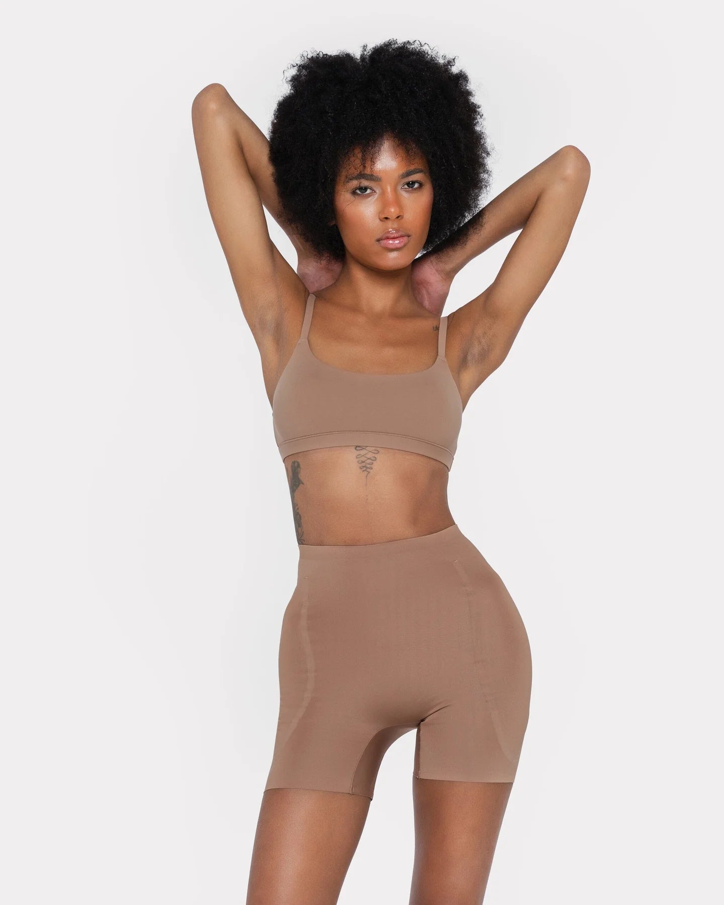 Beige hip and booty boosting shorts with silicone waistband and removable foam pads — Underhance | Endless UAE